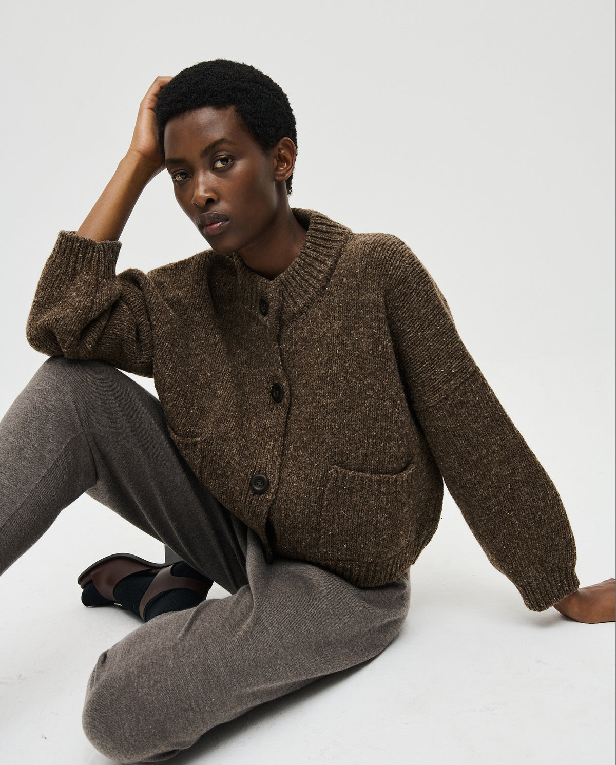 Babaà No23 Oak women's cardigan in soft brown, featuring a cozy knit design and button front detail.