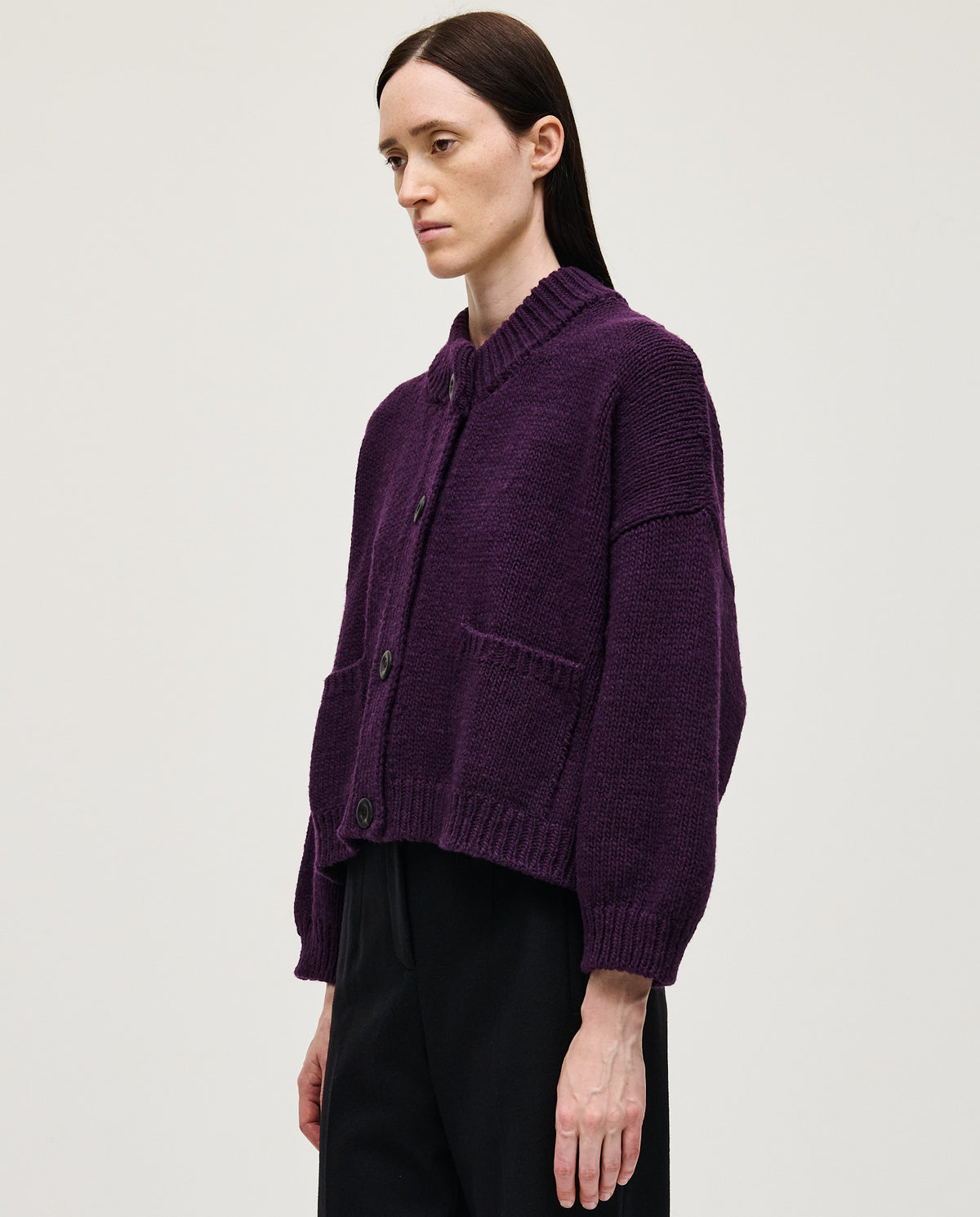 Purple Babaà No23 women's cardigan displayed on a model, showcasing its cozy knit and stylish design.