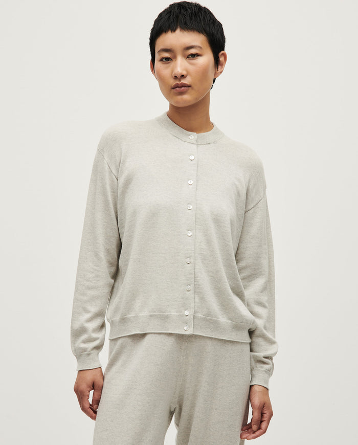 Babaà No25 Estrella women's cardigan in soft knit, featuring a cozy design and star pattern, displayed on a hanger.
