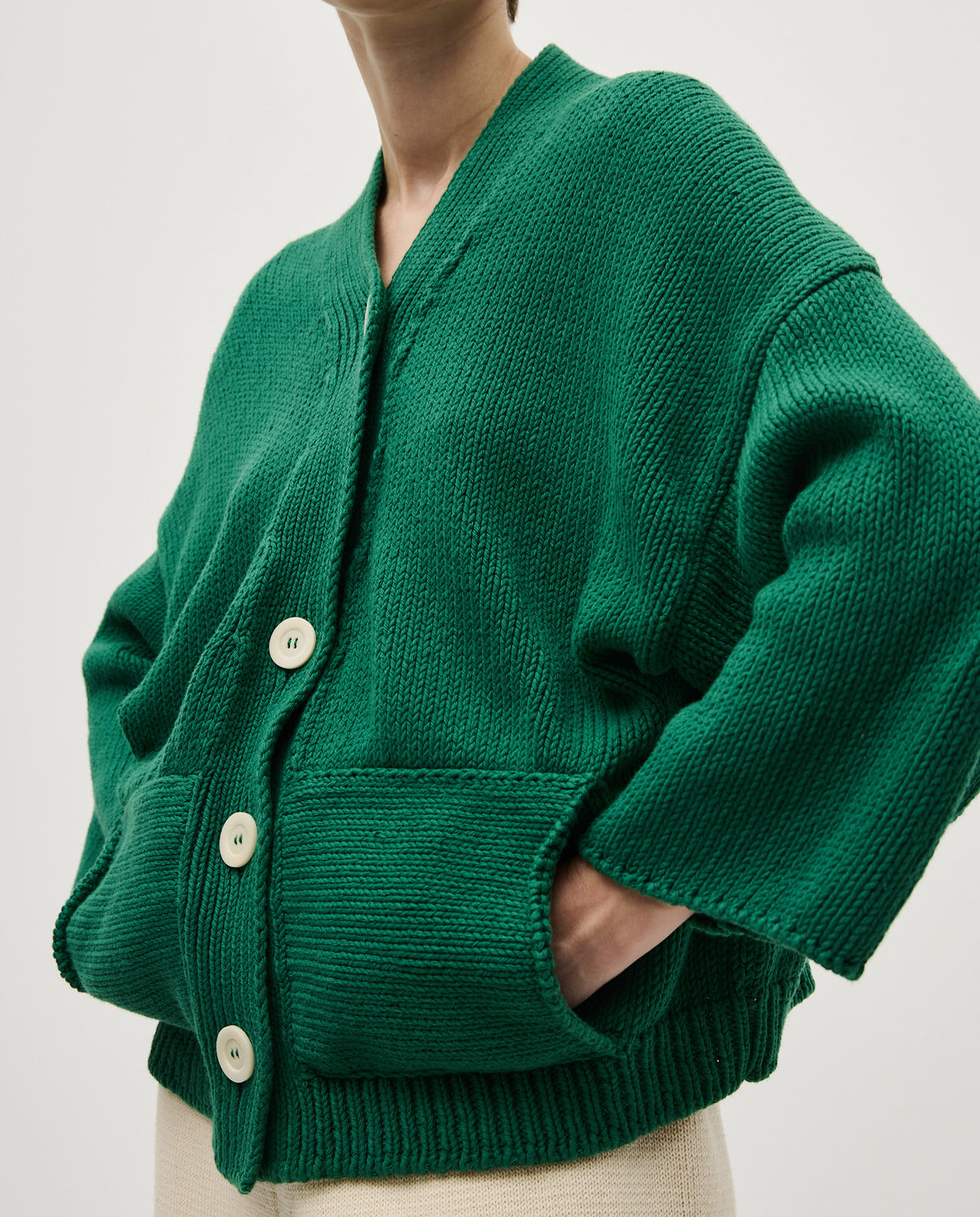 Babaà No26 Tree Fern women's cardigan featuring a soft knit fabric and a relaxed fit, shown in a natural pose.
