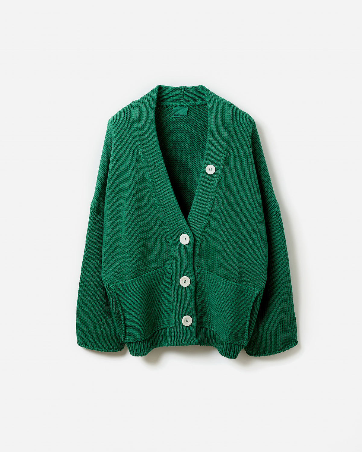 Babaà No26 Tree Fern women's cardigan shown in silhouette, featuring a cozy knit design and tree fern pattern.