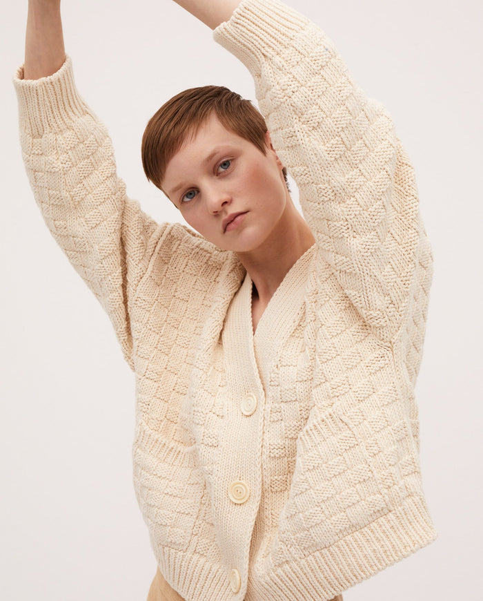Babaà No3 natural women's cardigan featuring soft, knitted fabric with a classic open-front design and long sleeves.