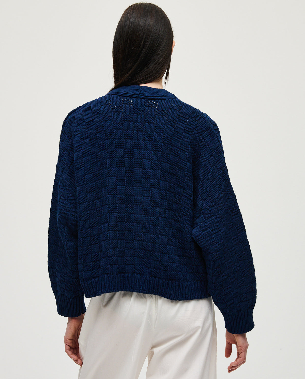 Navy women's cardigan no3 by Babaà, soft knit fabric, long sleeves, and button-up front, styled on a model.