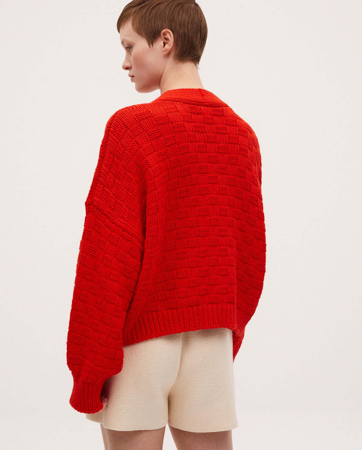 Babaà No3 Summer Flame women's cardigan featuring lightweight knit fabric in vibrant flame color, styled on a model.