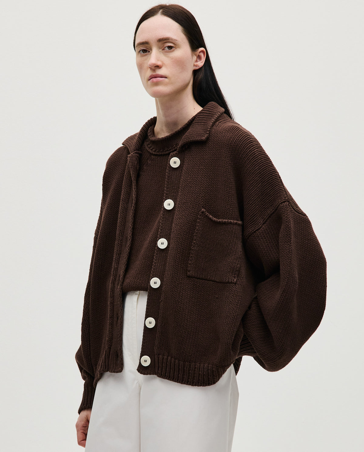 Babaà No44 husk women's cardigan featuring a soft, textured knit fabric and a relaxed fit, styled with buttons and long sleeves.