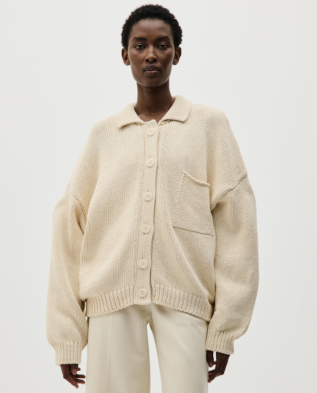 Babaà no44 natural women's cardigan, soft knit fabric with a relaxed fit, featuring a button-up front and long sleeves.