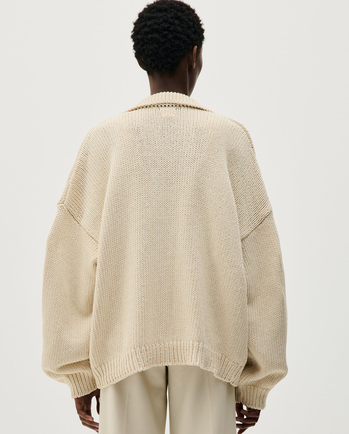 Babaà No44 natural women's cardigan, soft knit fabric, with long sleeves and open front, displayed on a neutral background.