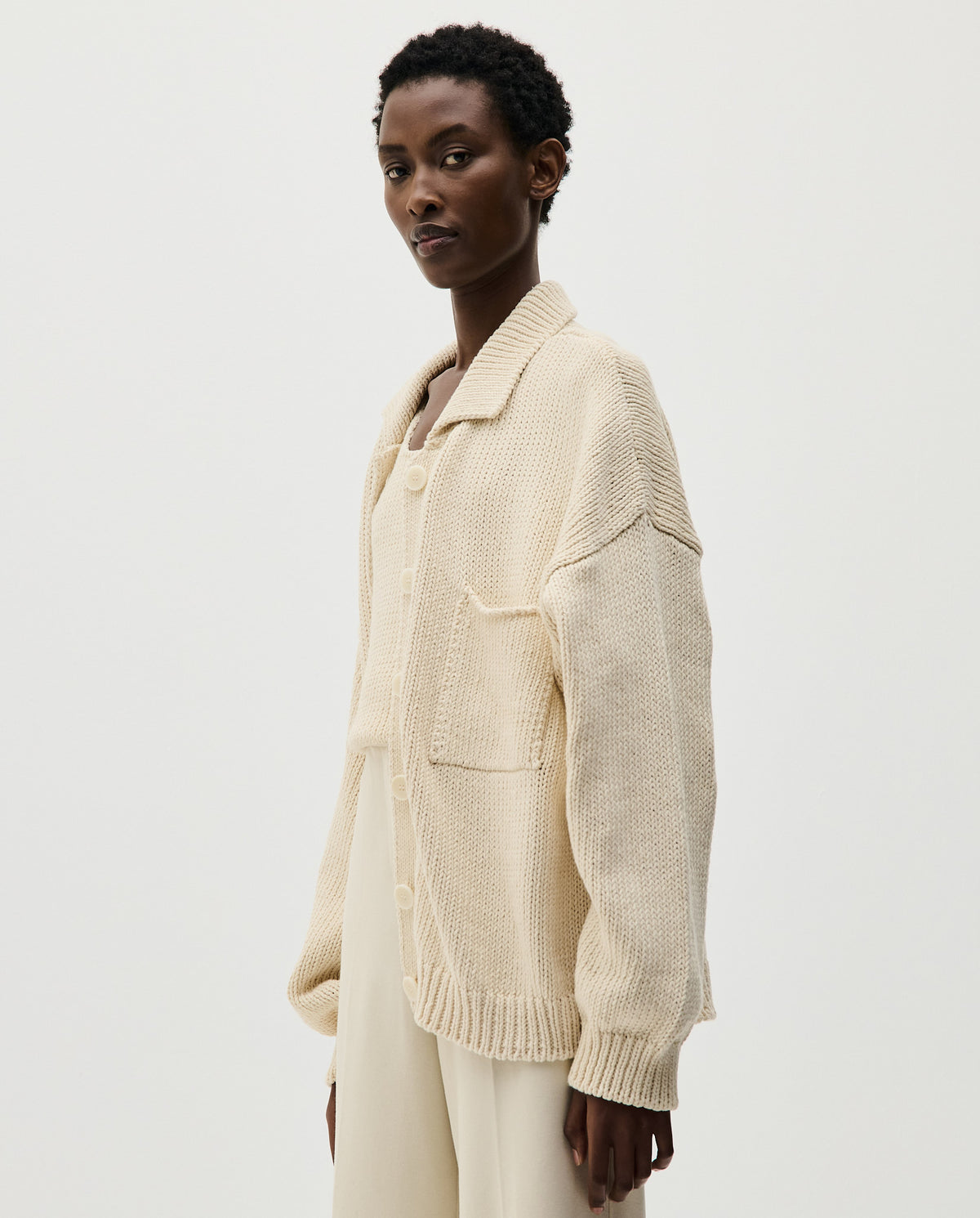 Babaà No44 natural women's cardigan featuring a soft, cozy knit with a relaxed fit and button-front design.