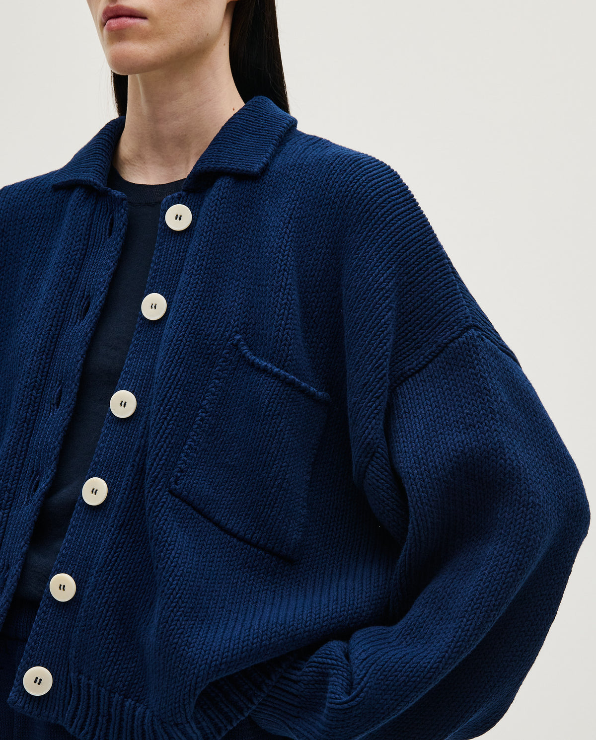 Navy women's cardigan No44 by Babaà, soft knit fabric, button-front design, and relaxed fit, shown on a model.