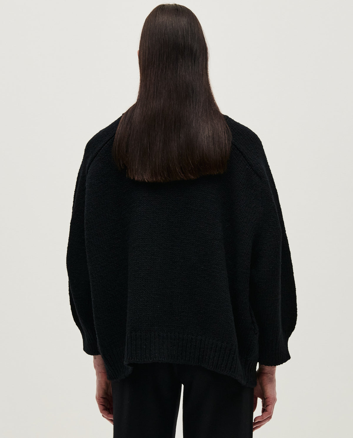 Black Babaà No51 women's cardigan with a soft knit fabric, featuring a relaxed fit and button closure.