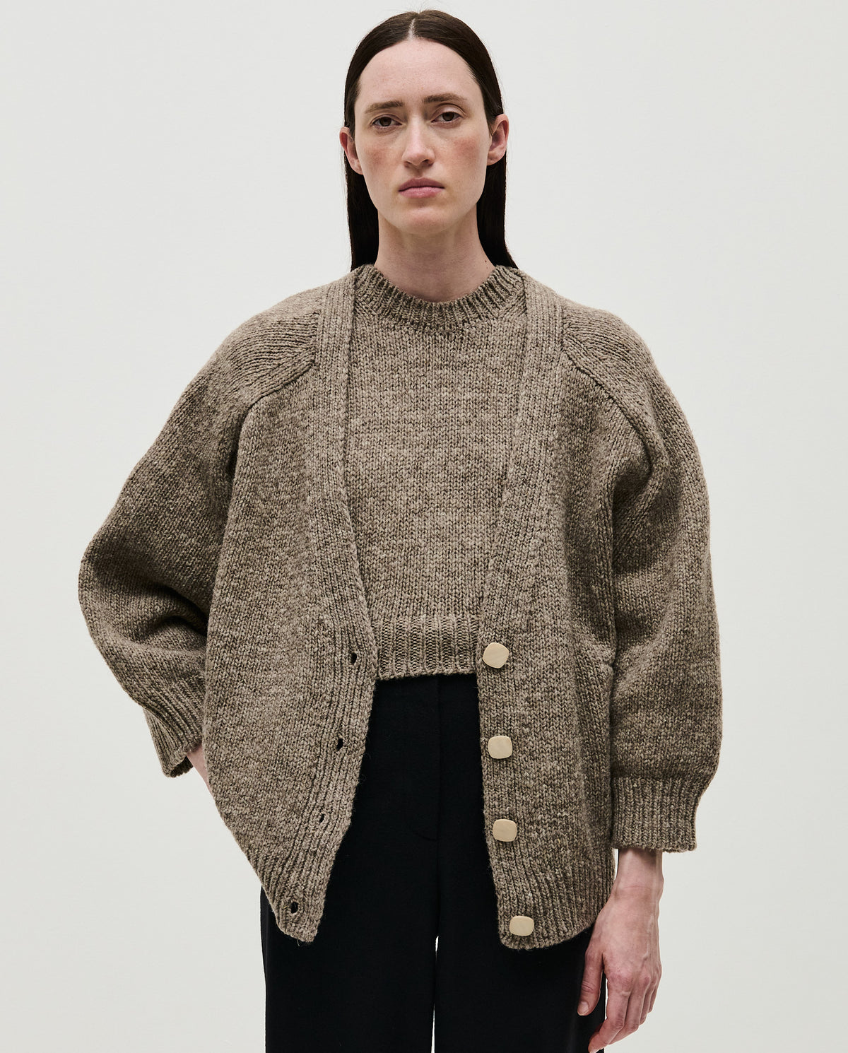 Babaà No51 dark mist women's cardigan displayed on a hanger with soft knit fabric and relaxed fit.