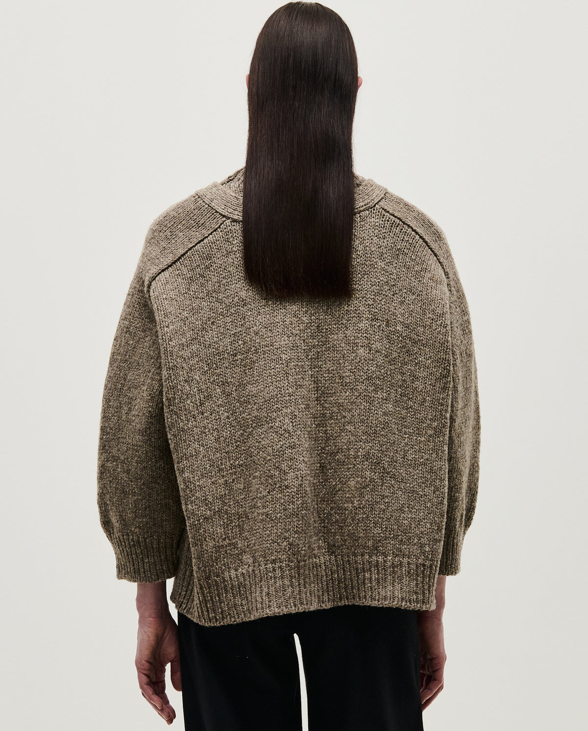 Babaà No51 dark mist women's cardigan displayed on a hanger with a soft, knit fabric and button closure.
