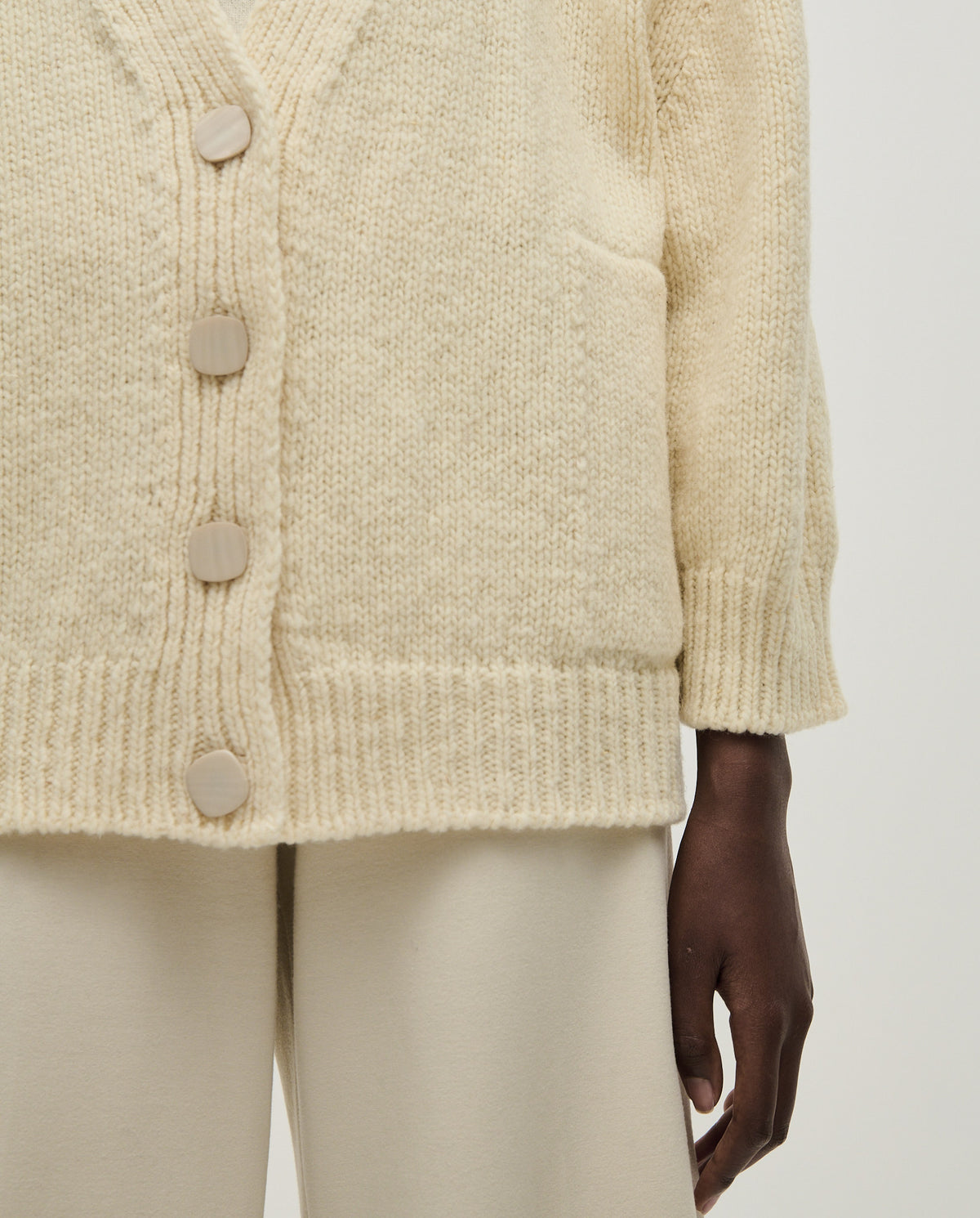 Babaà No51 natural women's cardigan featuring soft knit fabric and a relaxed fit, displayed on a model.