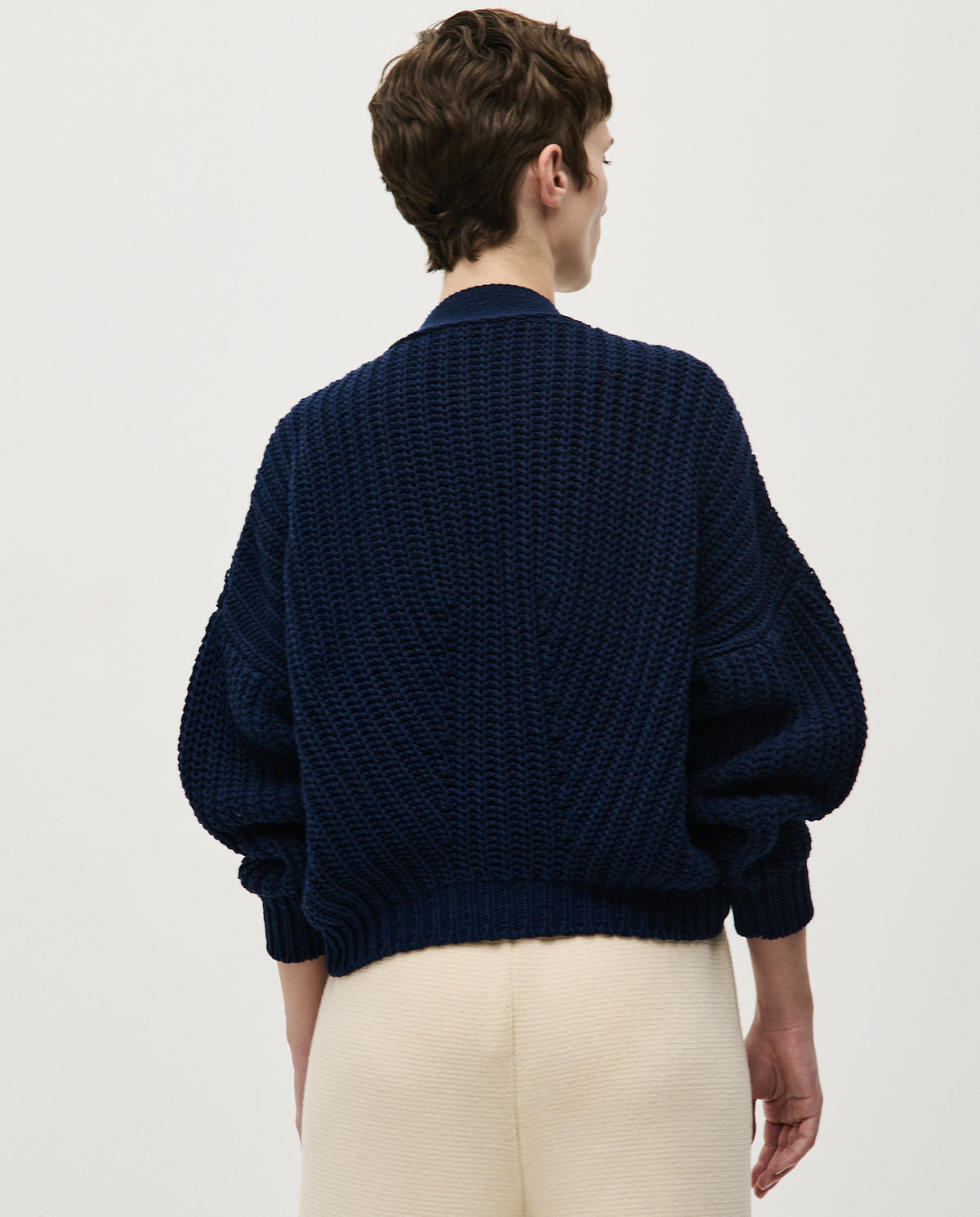 Navy women's Babaà No8 cardigan with button details, soft knit fabric, and a relaxed fit, perfect for casual wear.