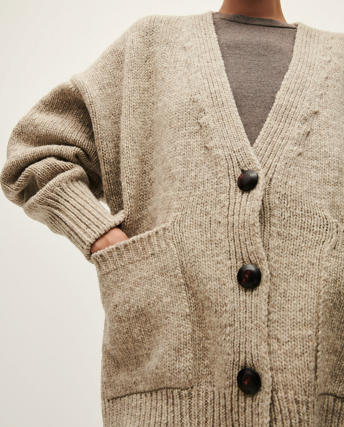 Babaà No17 Mist women's coat in soft fabric, displayed on a hanger with a neutral background.