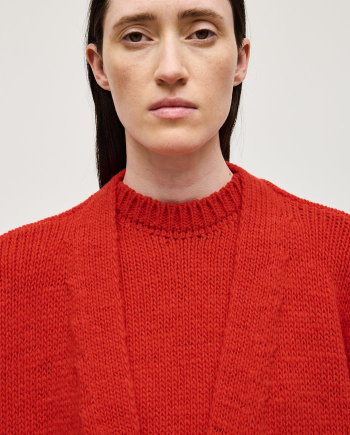 Red Babaà No17 women's coat displayed on a hanger, featuring a stylish collar and tailored fit.