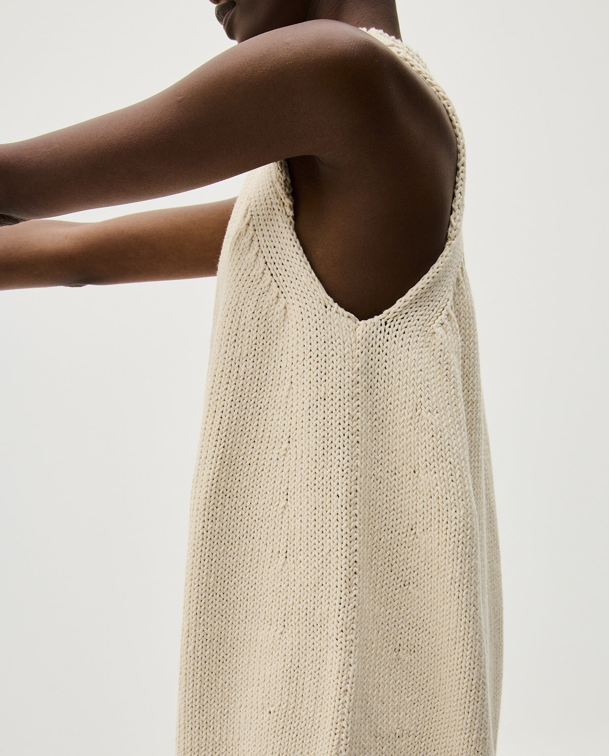 Babaà No46 Natural women's dress with a flowing design, lightweight fabric, and neutral color, displayed on a model.