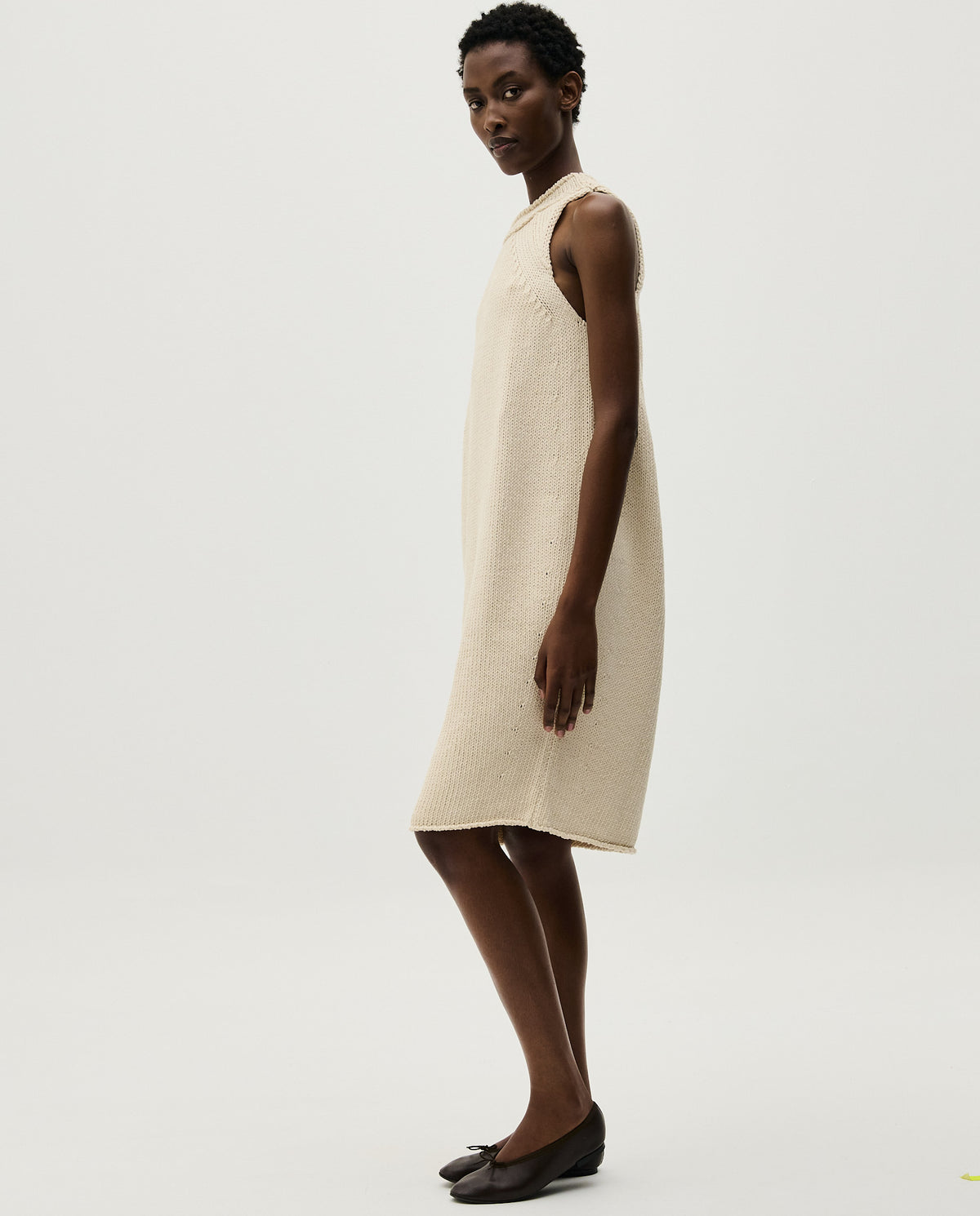 Woman wearing Babaà Dress No46 Natural, a stylish and comfortable casual dress with a relaxed fit and natural fabric appearance.
