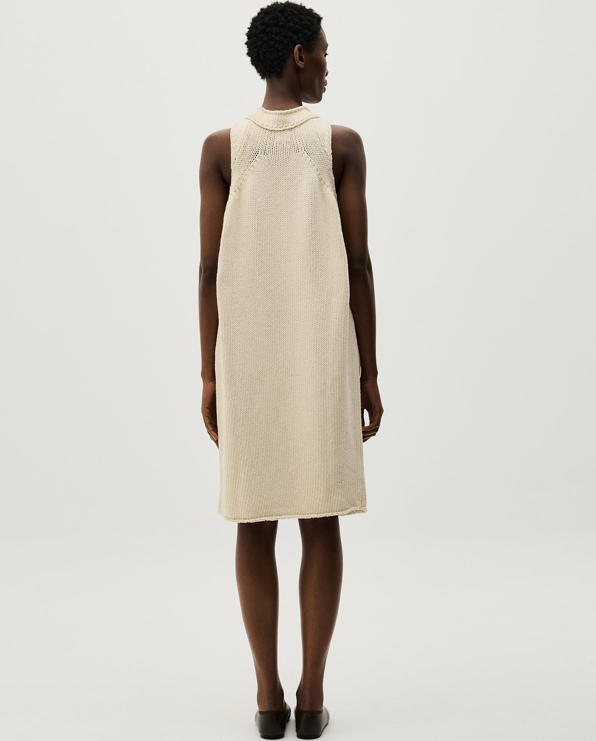 Natural-colored Babaà Dress No46 for women, showcasing a stylish and comfortable design, perfect for casual or semi-formal wear.