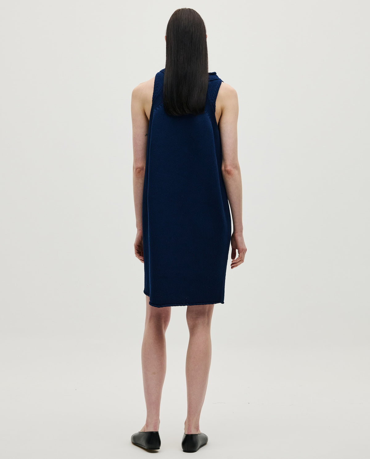 Navy Babaà Dress No46 worn by a woman, featuring elegant fabric and stylish design, perfect for casual or semi-formal occasions.