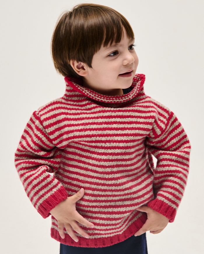 Bright red kids' jumper by Babaà featuring a cozy, soft knit fabric and a stylish, comfortable fit perfect for winter wear.
