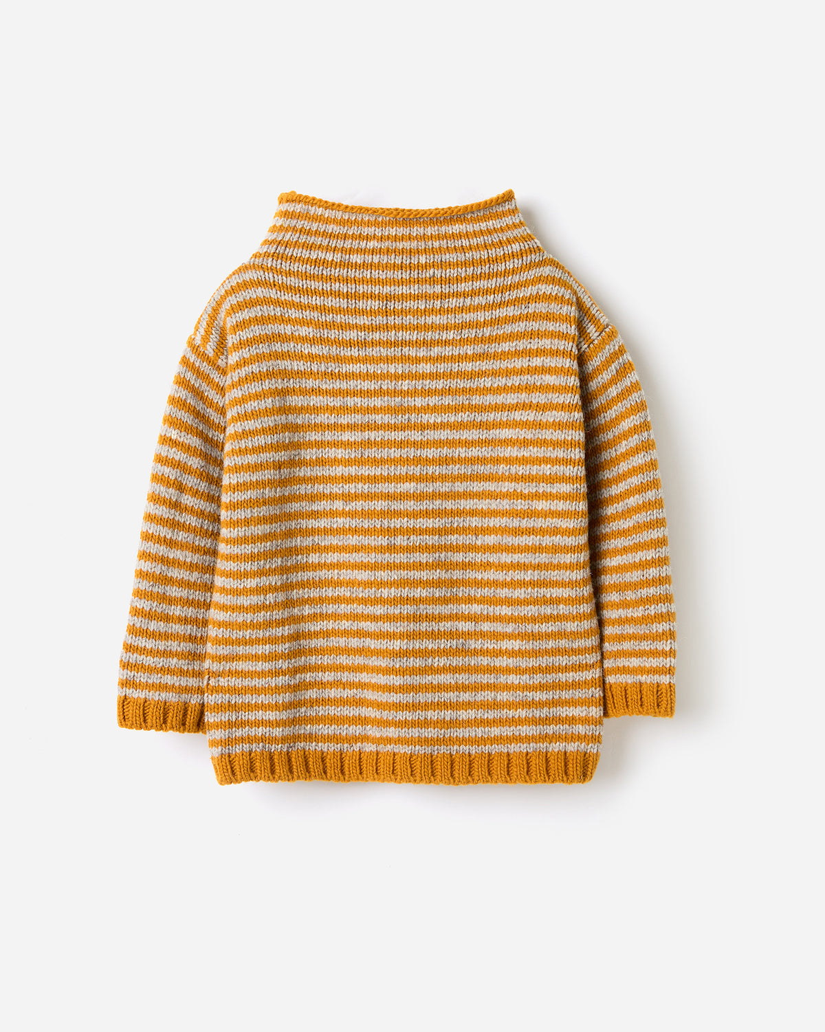 Kids' Babaà no6 ochre jumper, soft knitted sweater with long sleeves and ribbed cuffs, worn by a child.