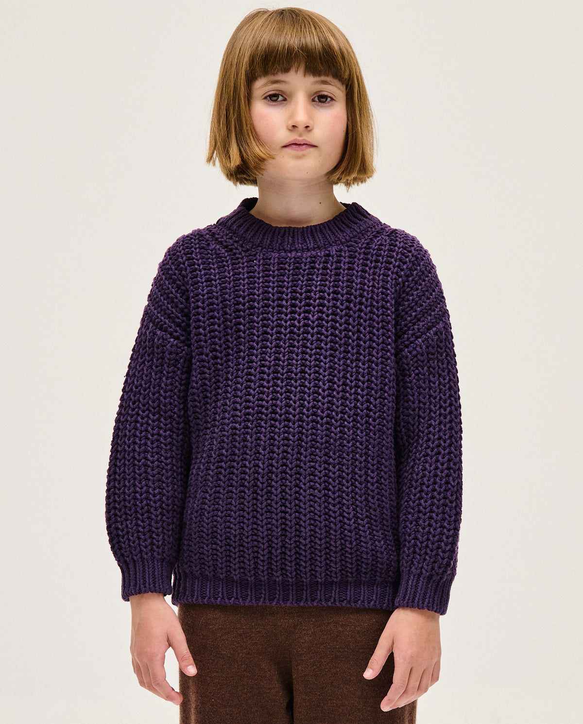 Kids' Babaà No18 Ridge jumper in soft fabric, featuring a cozy design with ribbed cuffs and a stylish pattern.