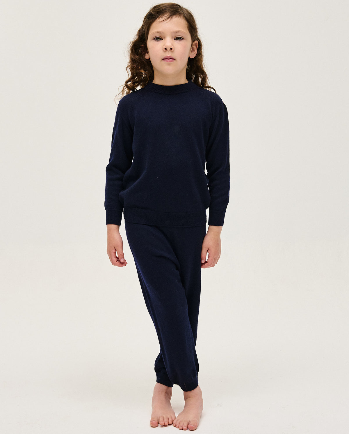 Navy kids' jumper from Babaà, featuring a cozy knit design and ribbed cuffs, perfect for children's casual winter wear.