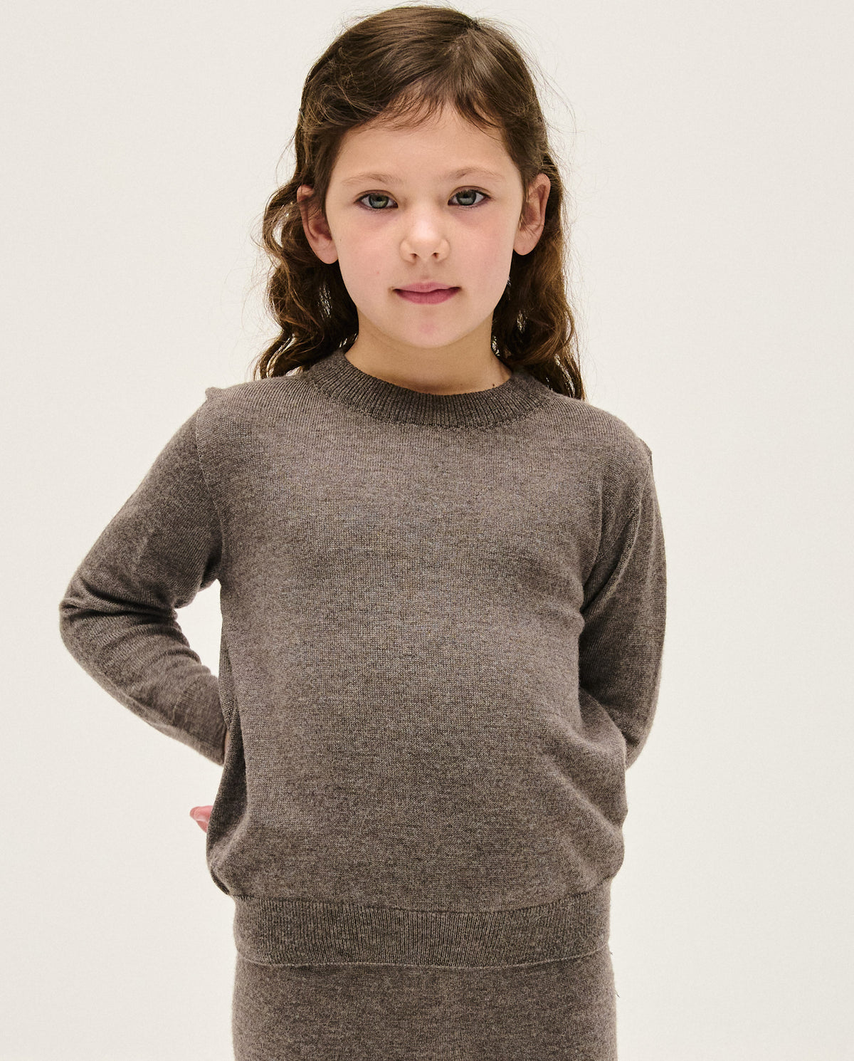 Kids' jumper from Babaà No25 Volcán, featuring a cozy, colorful design with a high neckline and playful pattern.