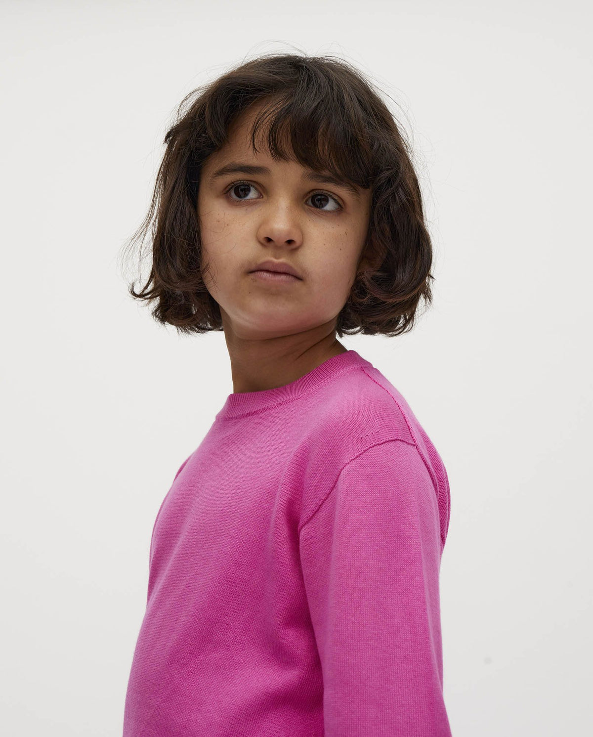 Kids' jumper by Babaà with hibiscus flower print, featuring vibrant floral design and cozy fabric for children.