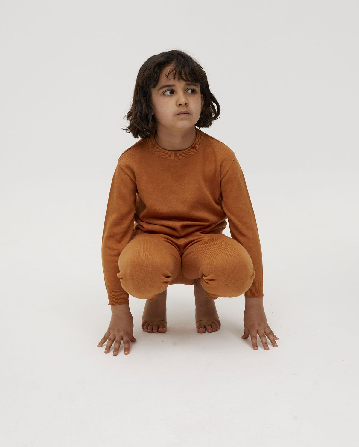 Kids' trousers No37 by Babaà featuring a comfortable fit and stylish design, shown in a natural fabric jumper style.