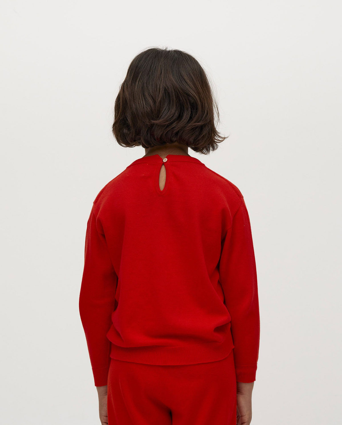 Kids' summer flame jumper by Babaà featuring a vibrant flame design, made from soft, breathable fabric for comfortable wear.