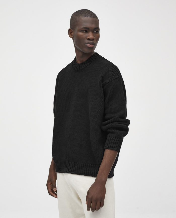 Black Babaà No16 men's jumper displayed on a model, featuring a comfortable fit and stylish design.