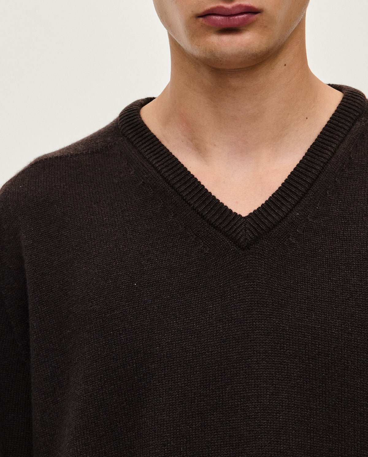Black Babaà No91 Blackwood men's jumper shown in black with a crew neckline and ribbed cuffs.
