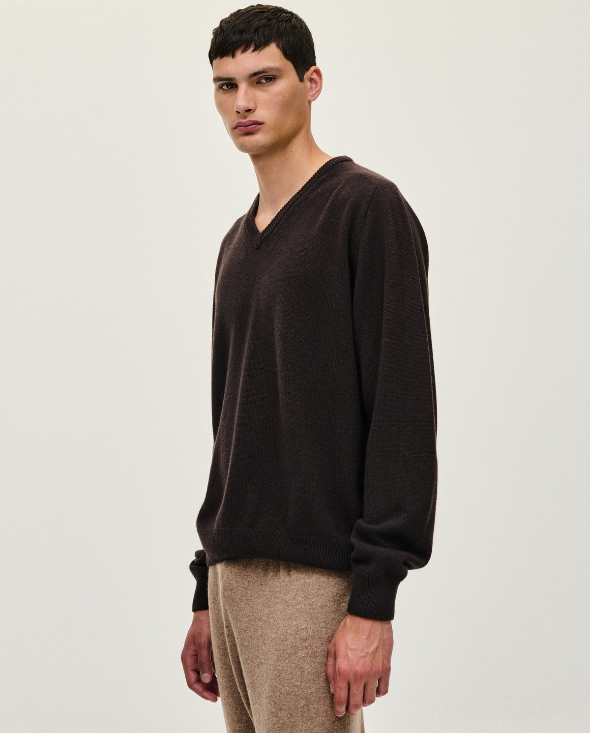 Black Babaà No91 Blackwood men's jumper displayed on a model, showcasing a stylish, comfortable knit sweater in black.
