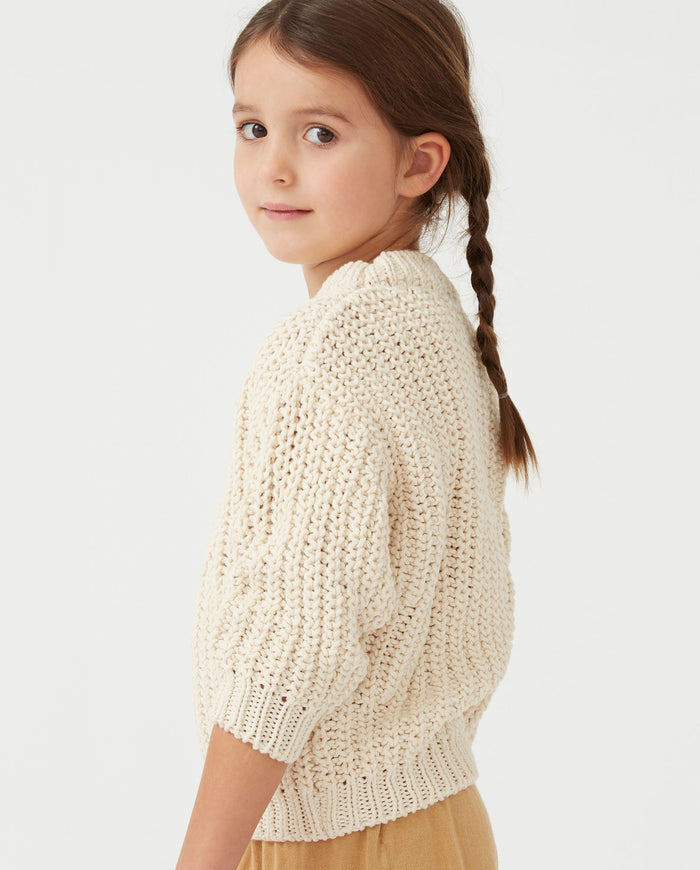Kids' no18 natural jumper by Babaà, soft beige knitted sweater with ribbed cuffs and collar, suitable for casual wear.