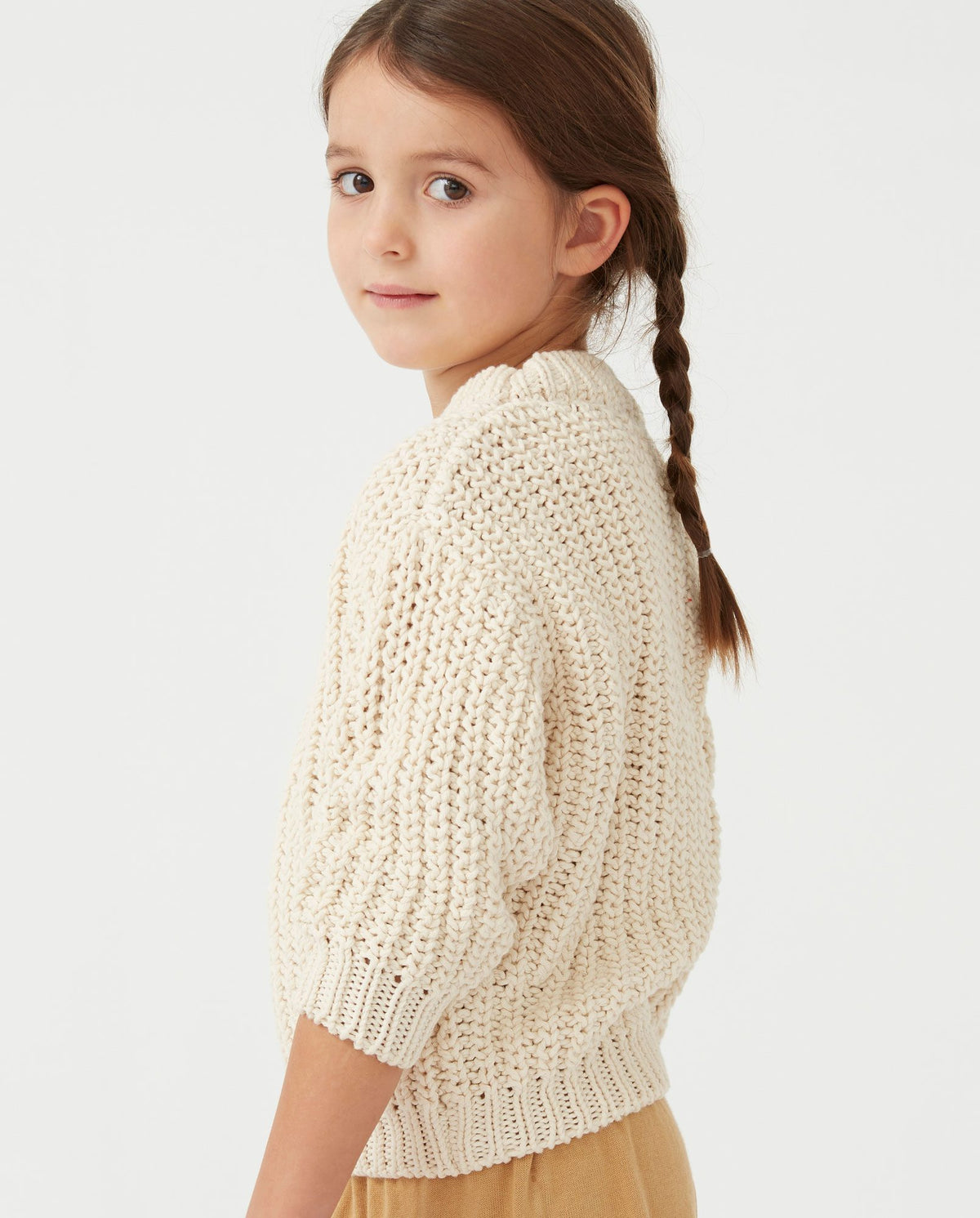 Kids' no18 natural jumper by Babaà, soft beige knitted sweater with ribbed cuffs and collar, suitable for casual wear.