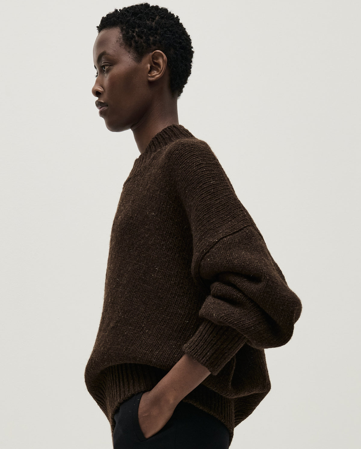 Babaà No11 Earth women's jumper displayed in a natural pose, featuring earthy tones and cozy knit fabric.