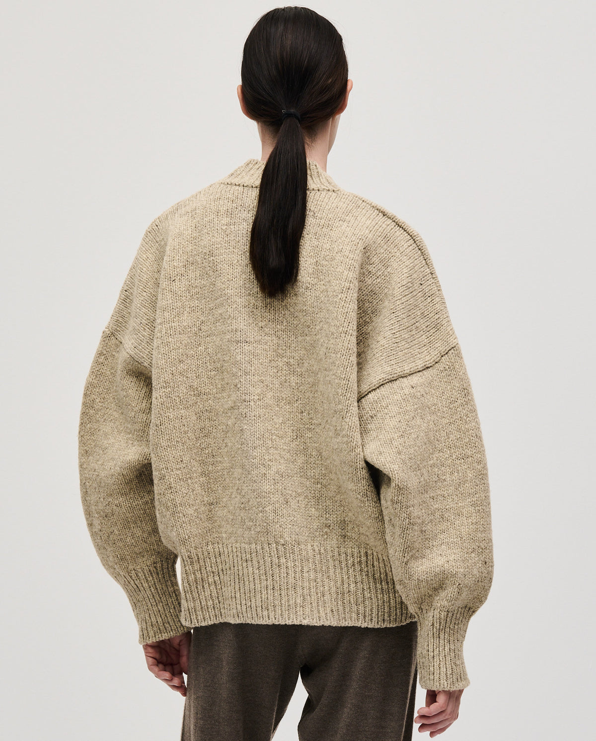 Babaà No11 Mist women's jumper featuring a cozy knit design in soft mist color, worn by a model.