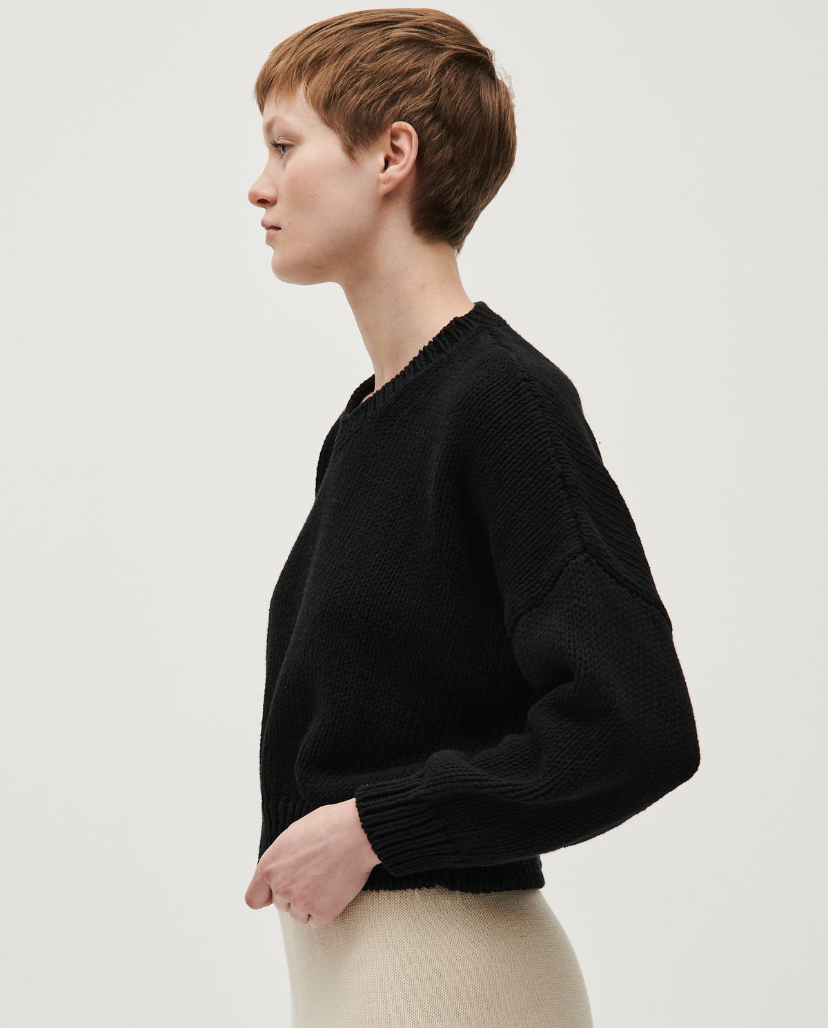 Black Babaà jumper No14 for women, featuring a cozy knit design, shown on a model.
