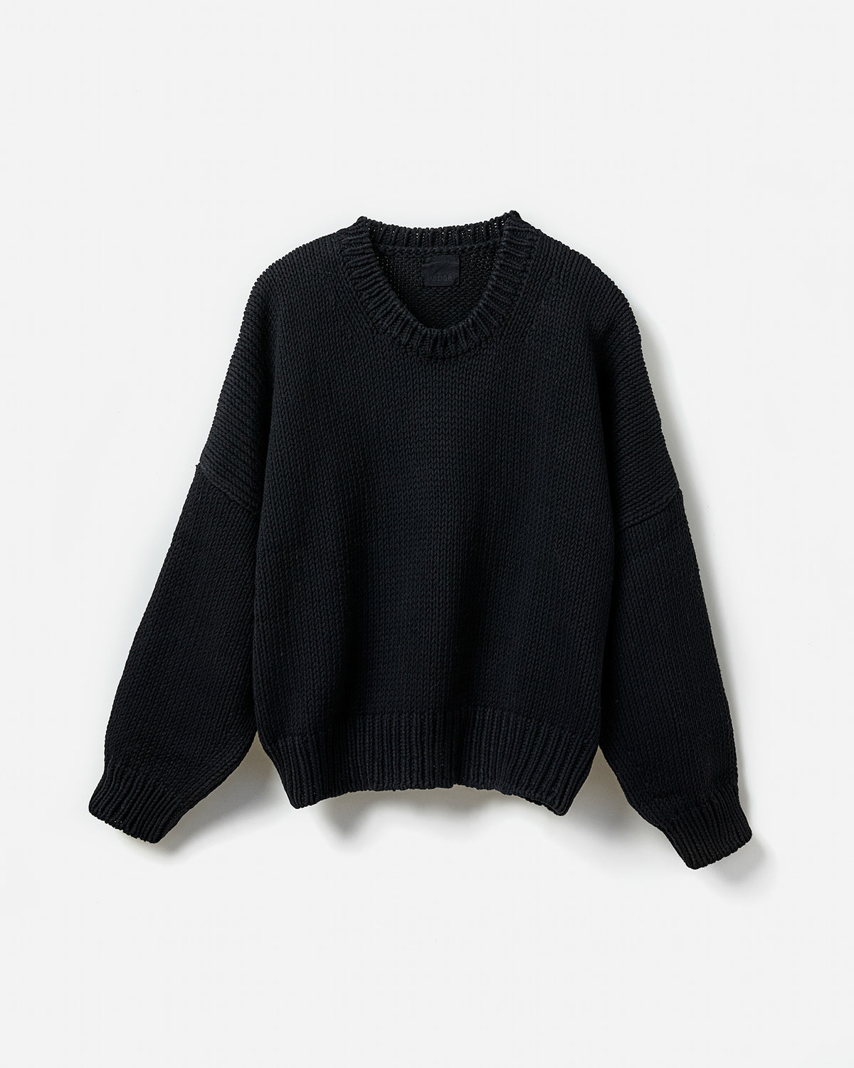 Black Babaà No14 women's jumper shown in a stylish silhouette, highlighting its cozy fit and elegant design.