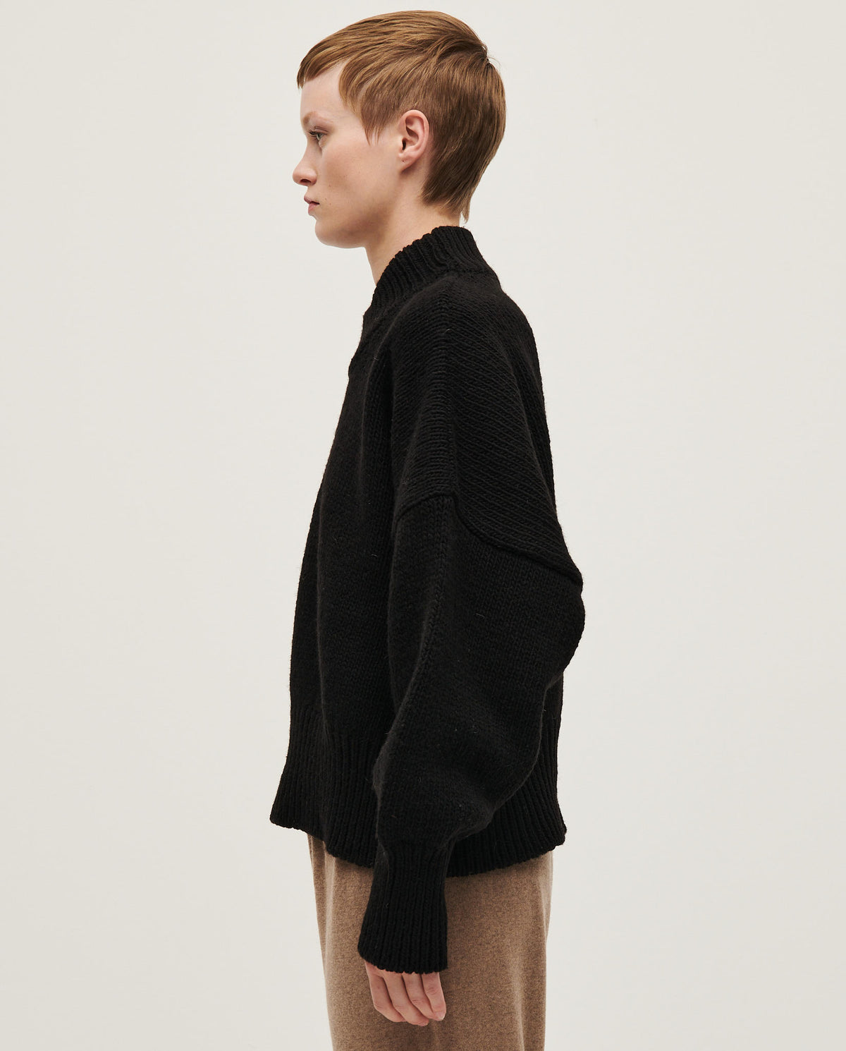 Black Babaà Jumper No15 for women, showing a cozy knit sweater with a relaxed fit and classic crew neckline.