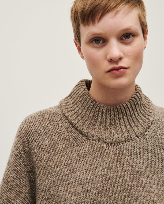 Babaà Women's Jumper No15 in Dark Mist, cozy knit sweater with long sleeves and relaxed fit, displayed on a hanger.
