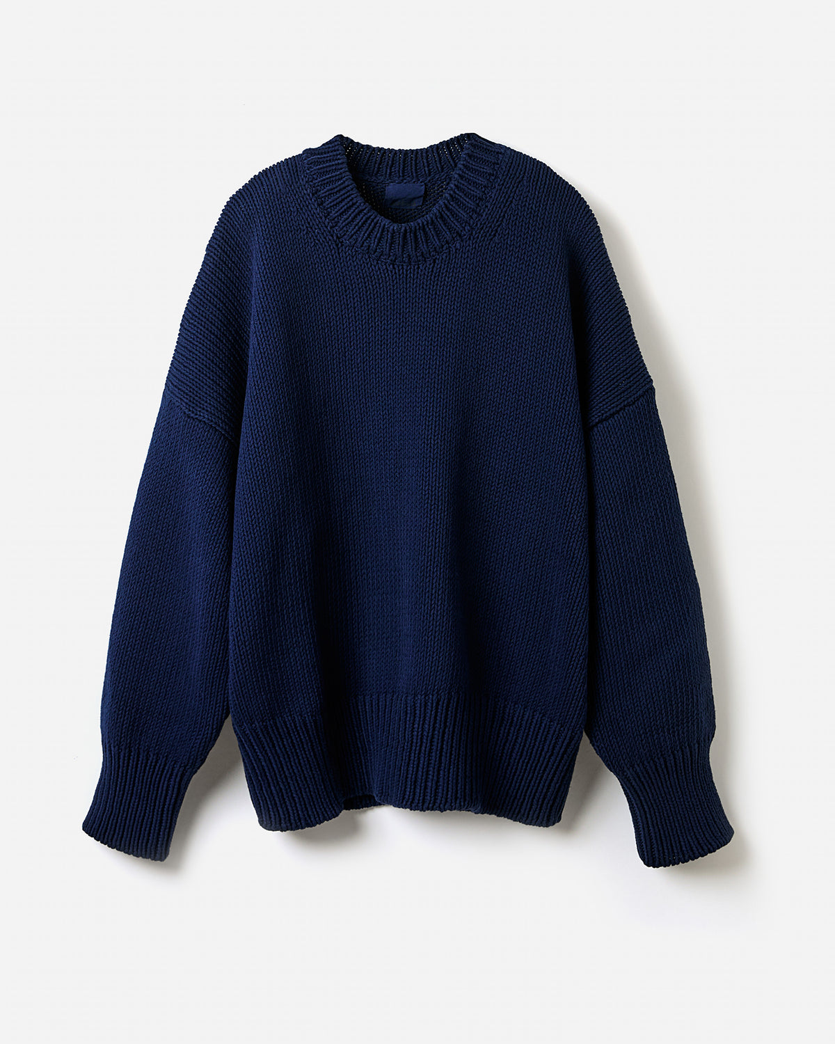 Navy Babaà jumper No16 worn by a woman, showcasing a relaxed fit and soft fabric in a stylish silhouette.