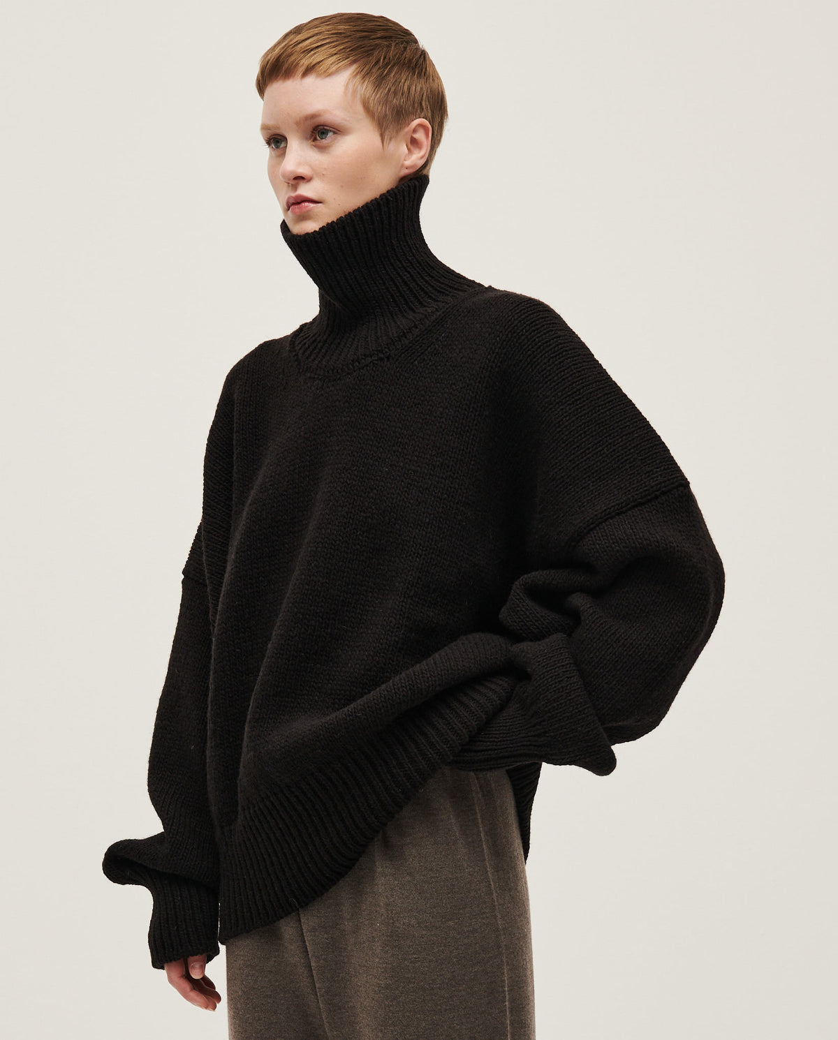 Black women's jumper No17 by Babaà, featuring a cozy, stylish knit design with long sleeves and a relaxed fit.
