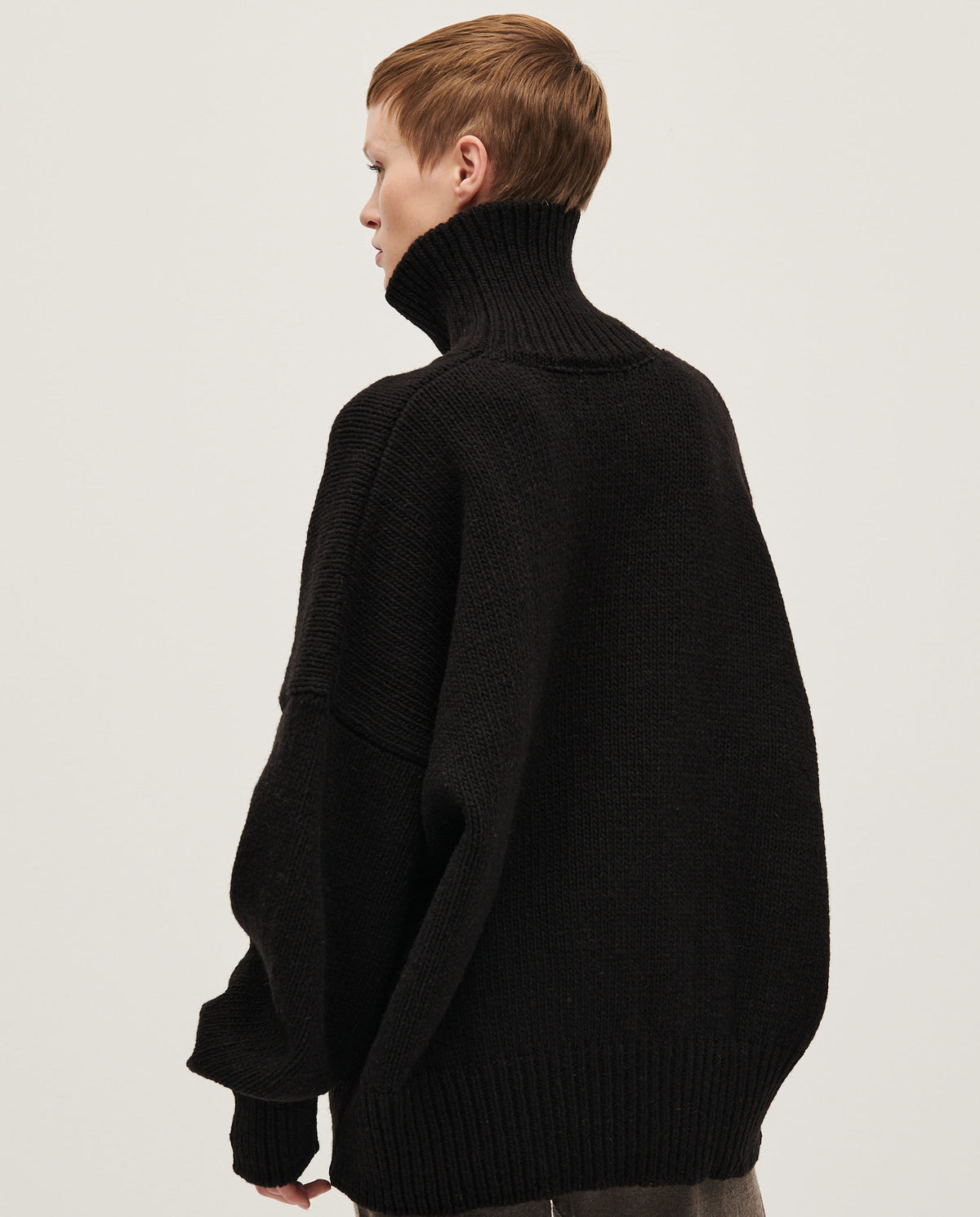 Black Babaà No17 women's jumper, featuring a cozy knit design and long sleeves, shown on a model.