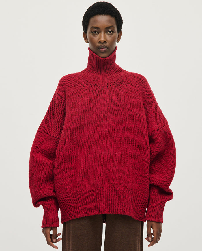Babaà No17 Cereza women's jumper in vibrant red fabric, featuring a cozy, stylish design suitable for casual wear.