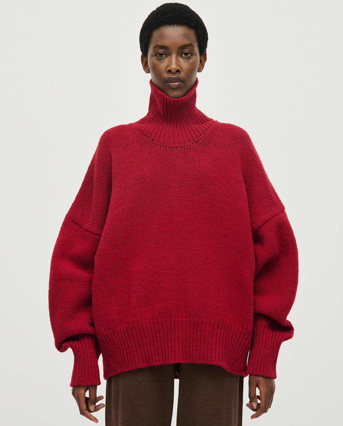 Babaà No17 Cereza women's jumper in vibrant red fabric, featuring a cozy, stylish design suitable for casual wear.