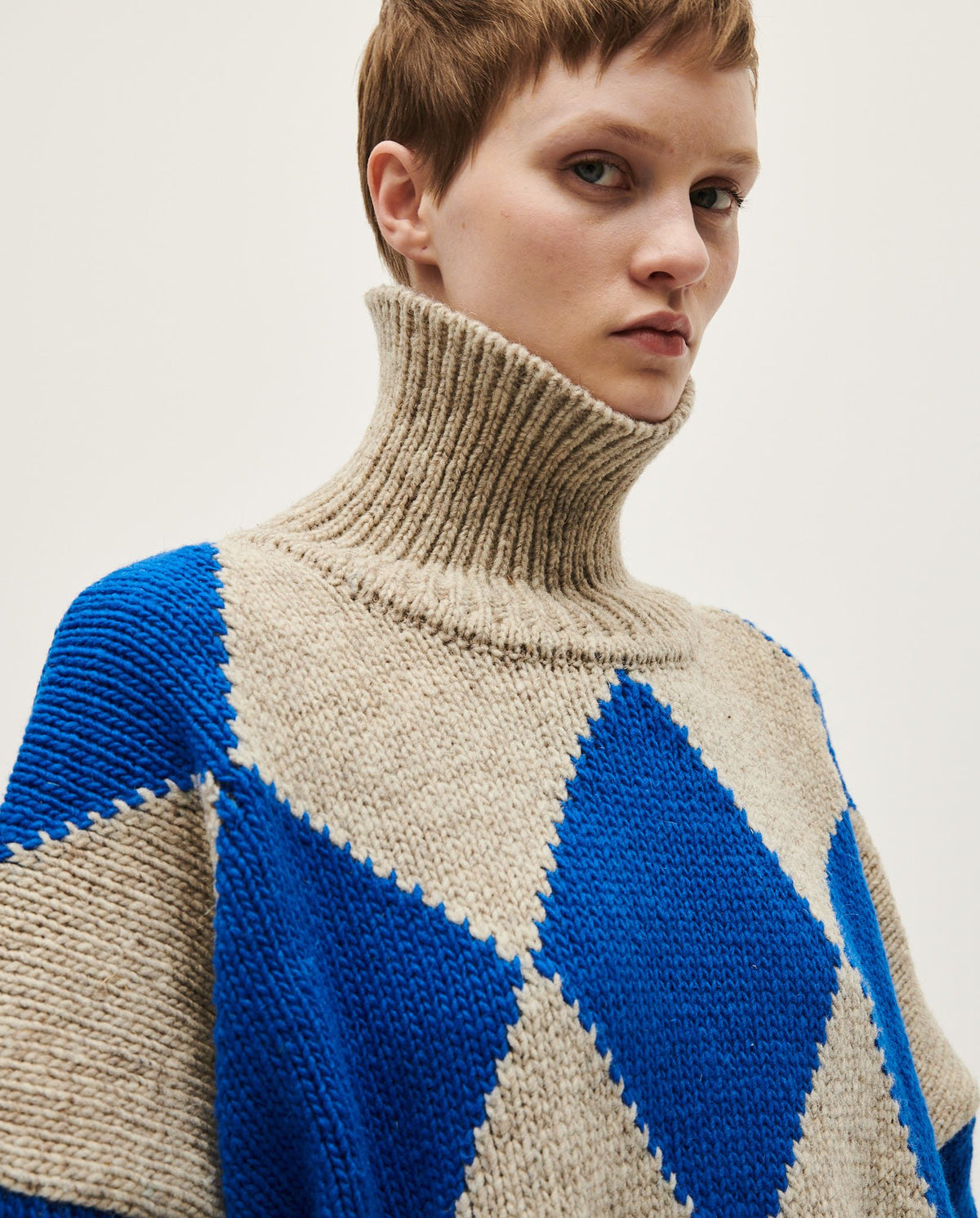 Babaà No17 Dawn women's jumper, soft knit sweater in light pastel color, styled casually on a woman.