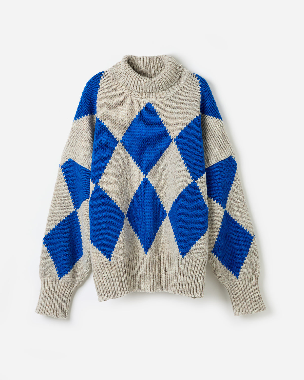 Silhouette of a woman wearing Babaà Jumper No17 Dawn, a stylish knitted sweater in a soft, warm color.